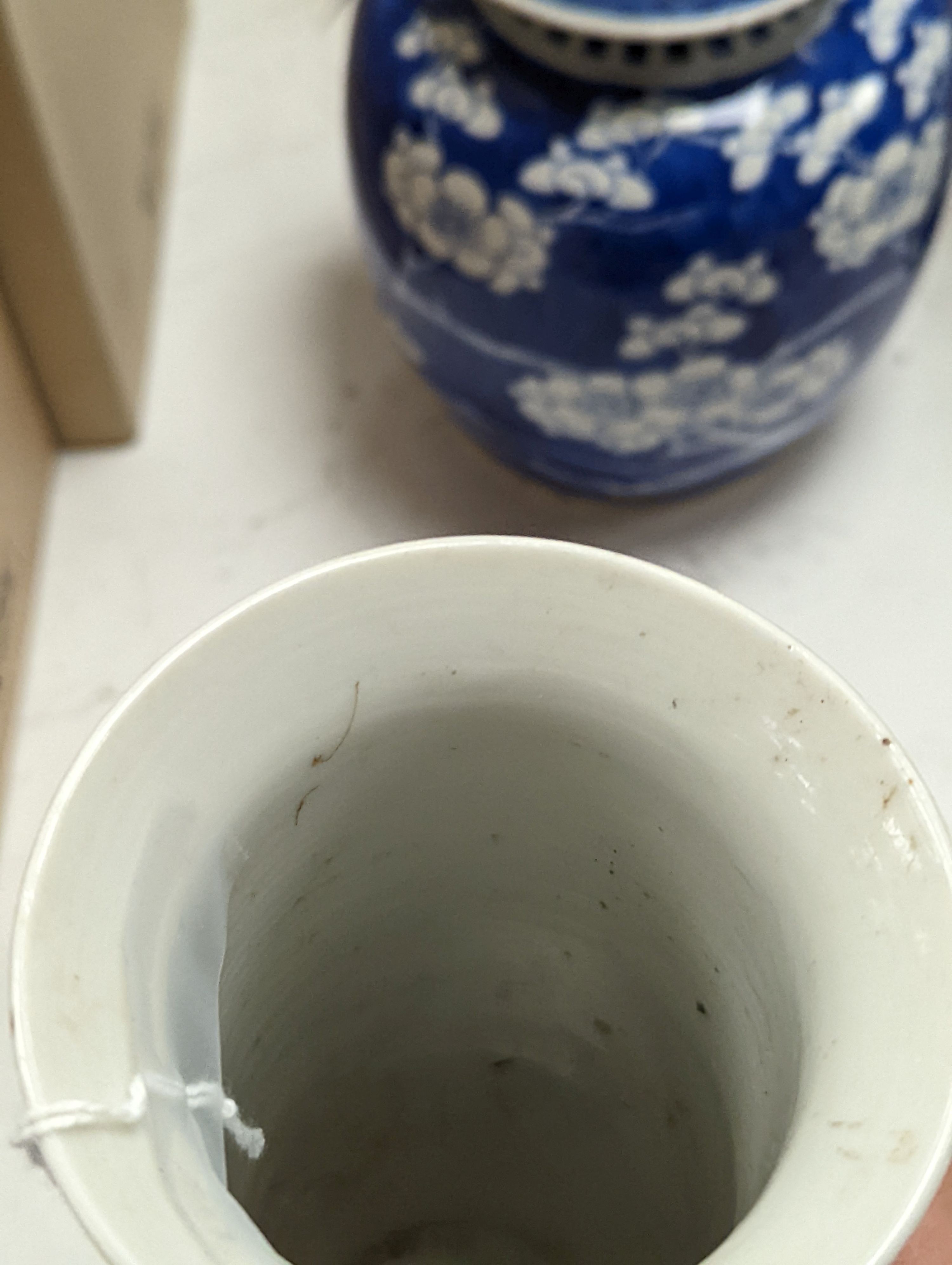 A Chinese famille rose ginger jar, a 19th century Chinese blue and white porcelain jar and cover, a blue and white cylinder vase, a small Chinese dish and orange glass vase (5)